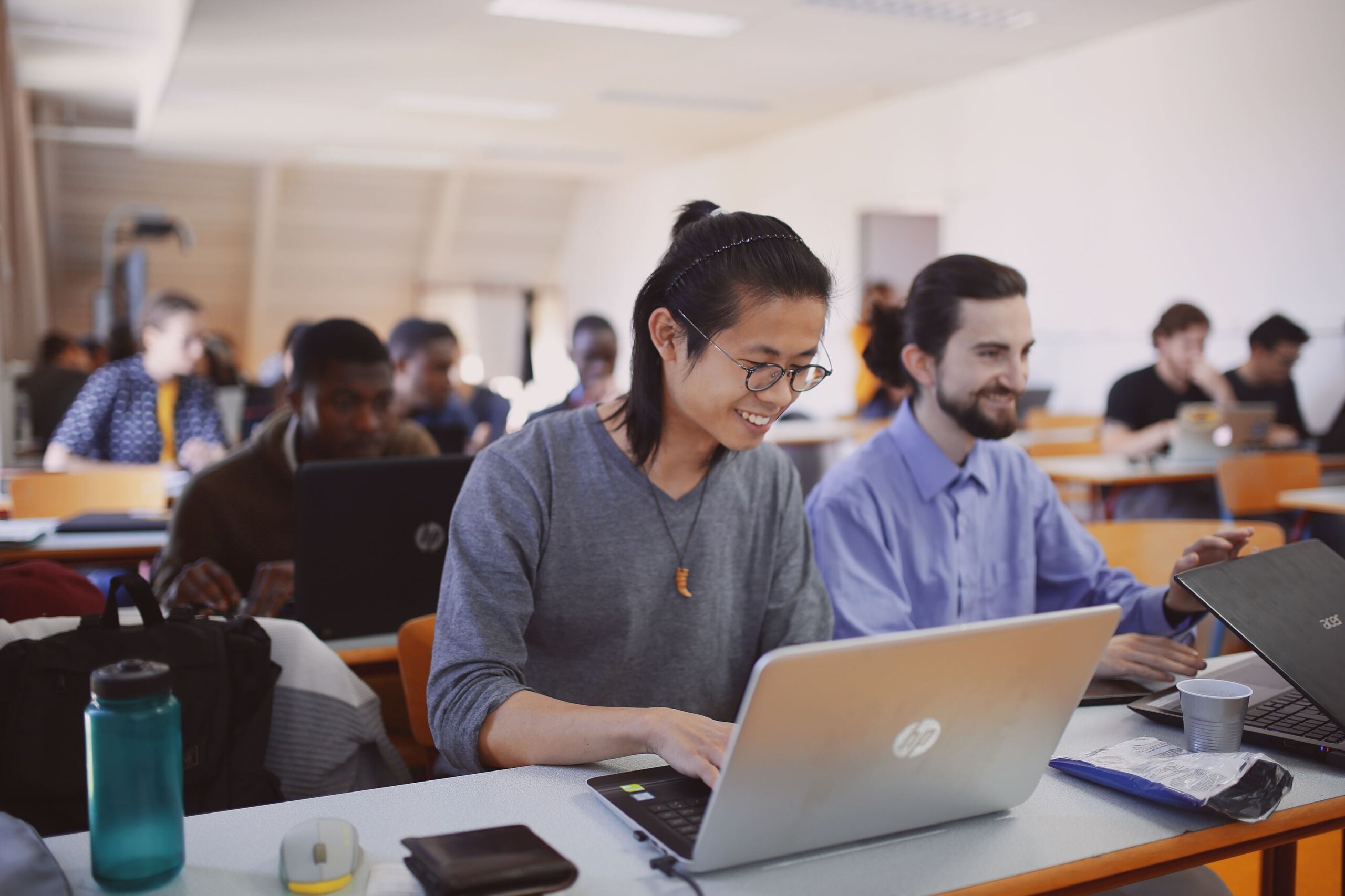 students in class with computer