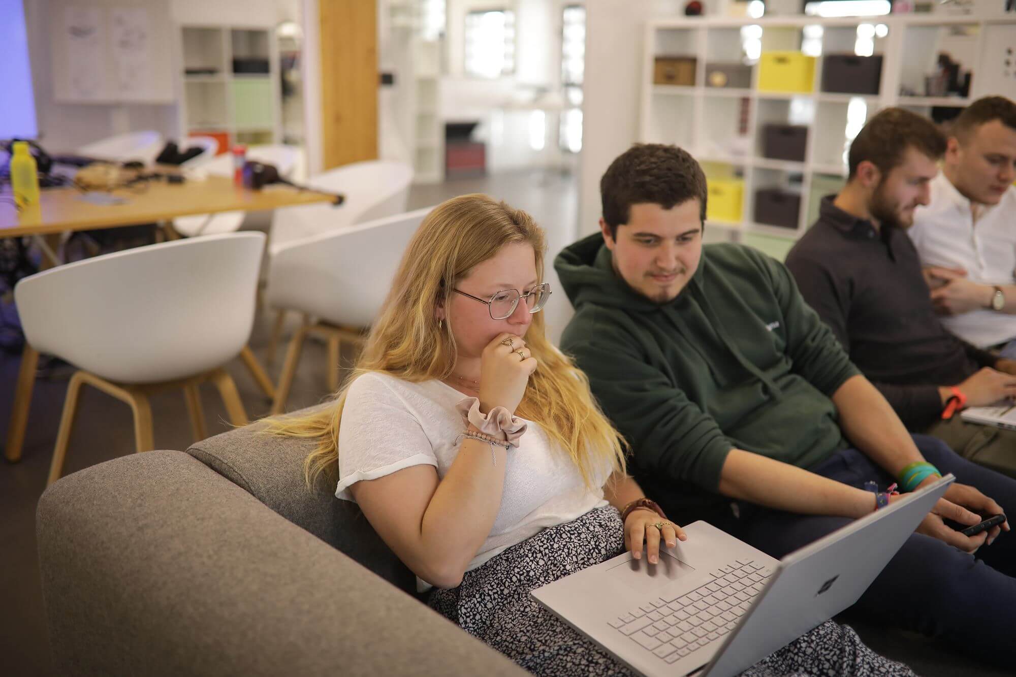 students working together on a computer