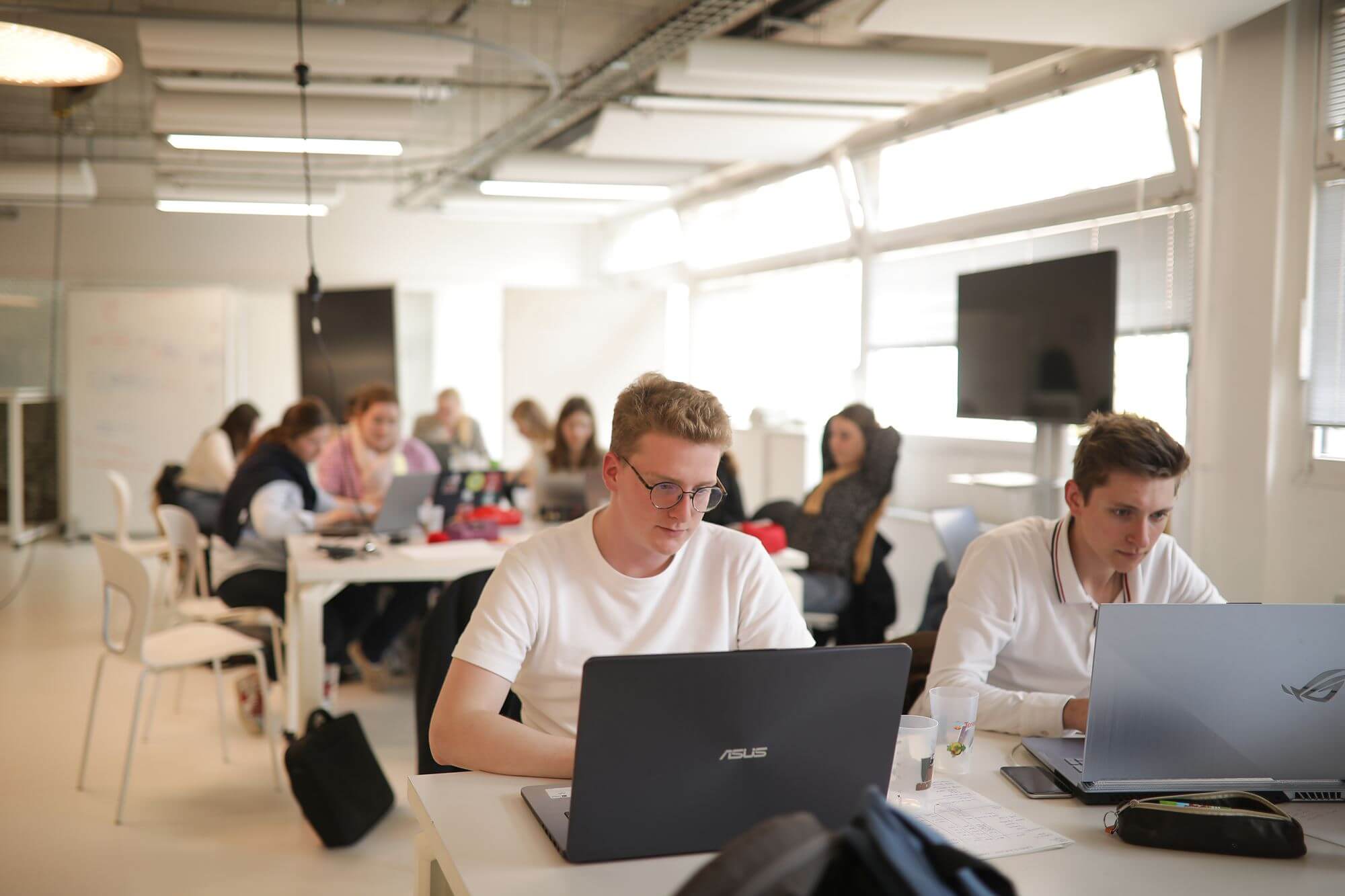 a student on his computer in a classroom