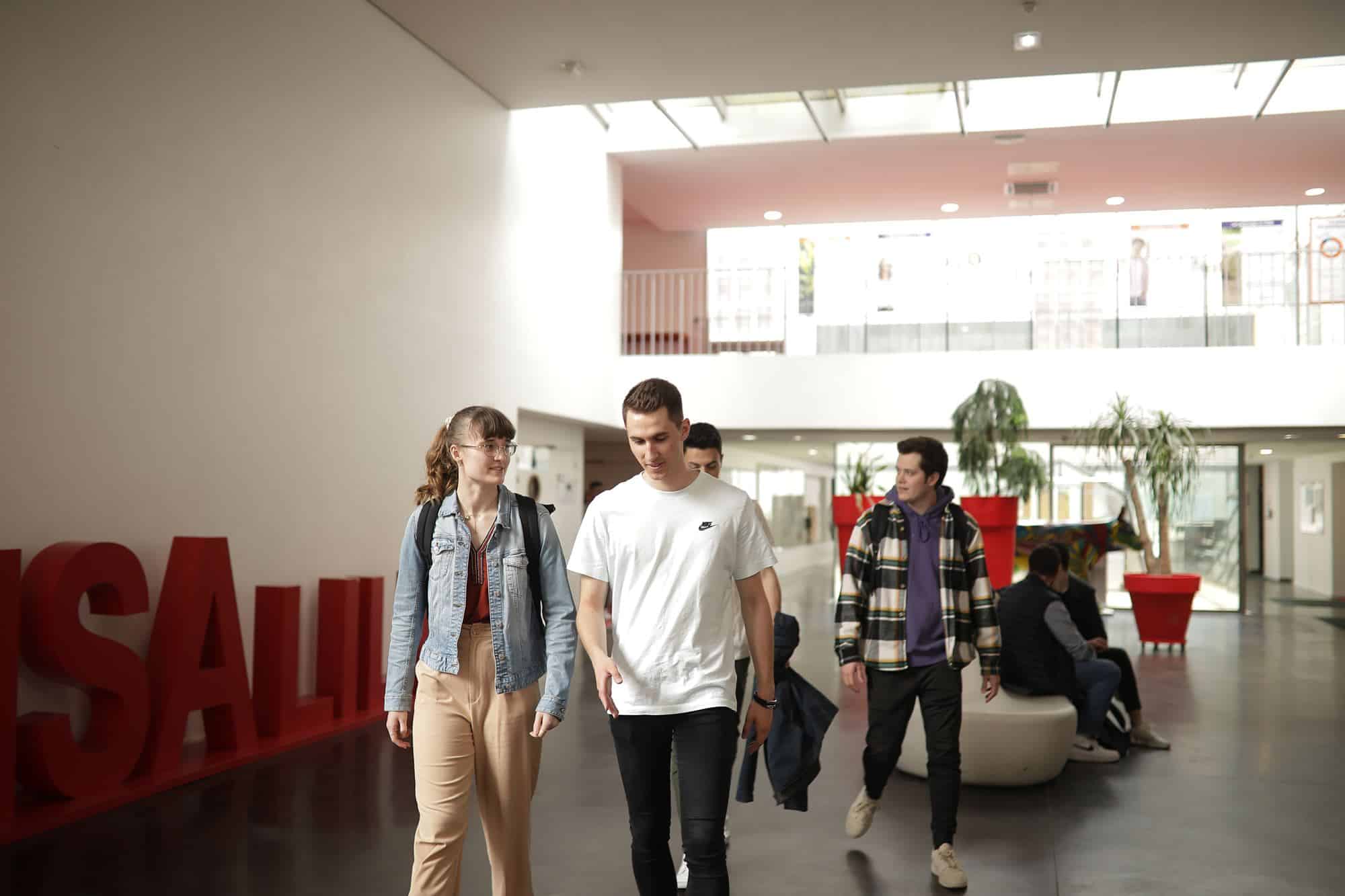 Students walking in the building