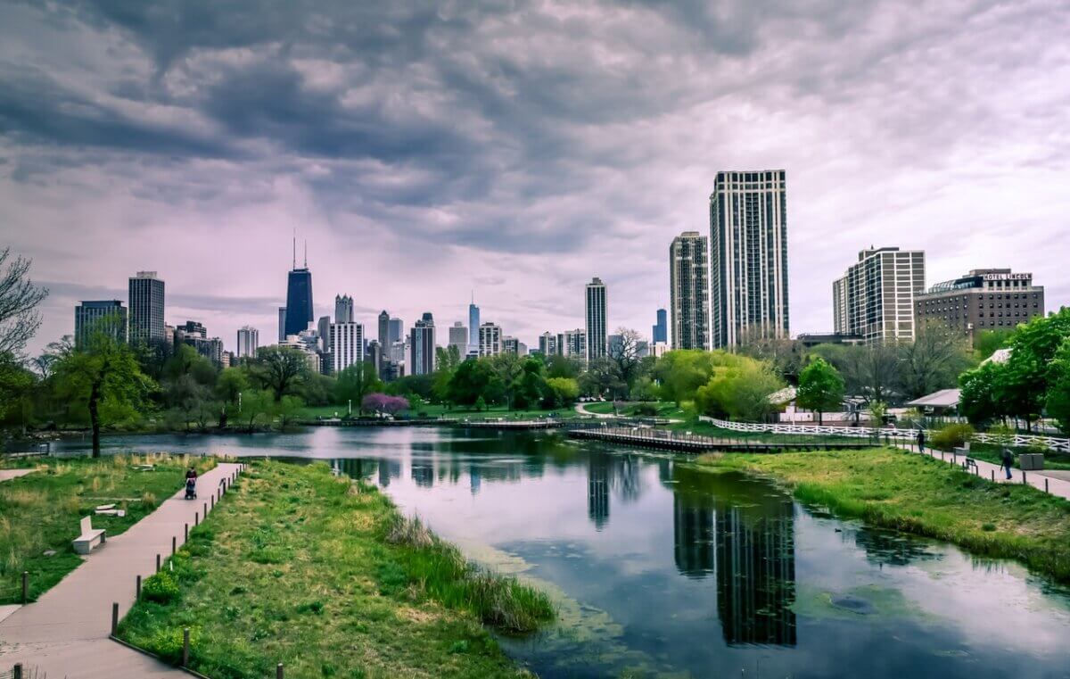 picture of a city with buildings surrounded by nature