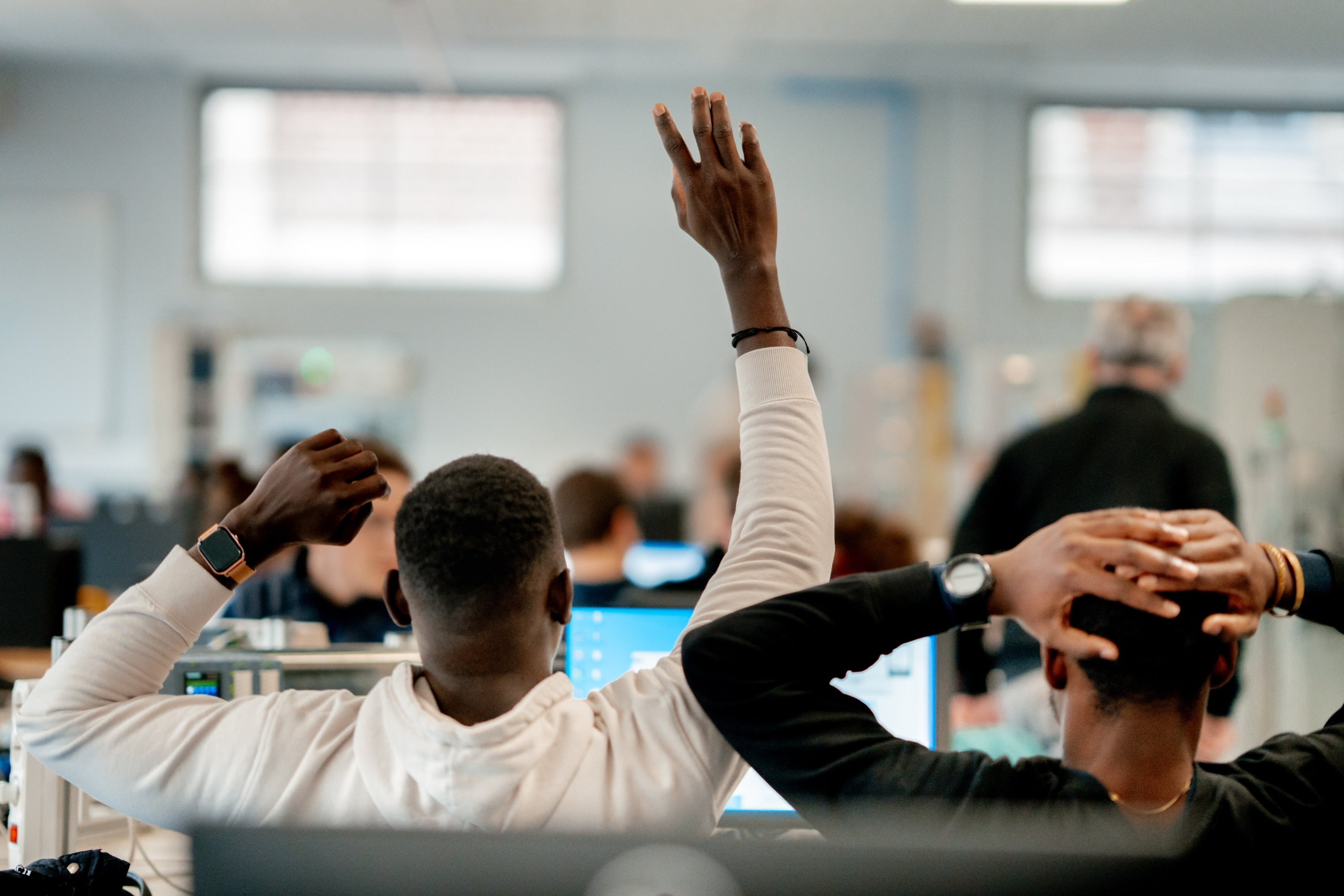 A student raises his hand